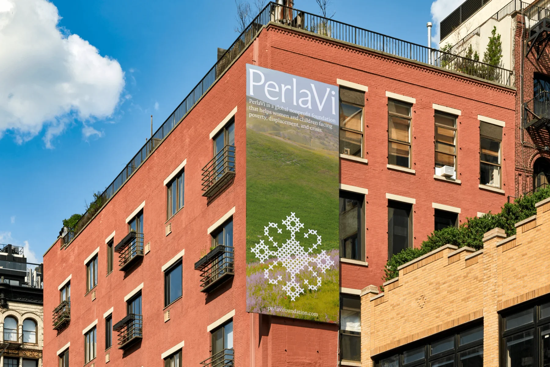 Tall PerlaVi banner with a landscape photograph and ornamental white graphic.