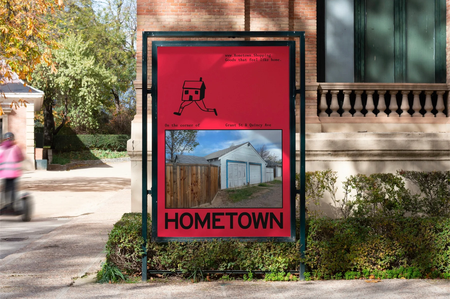Red Hometown street poster with a house photograph.