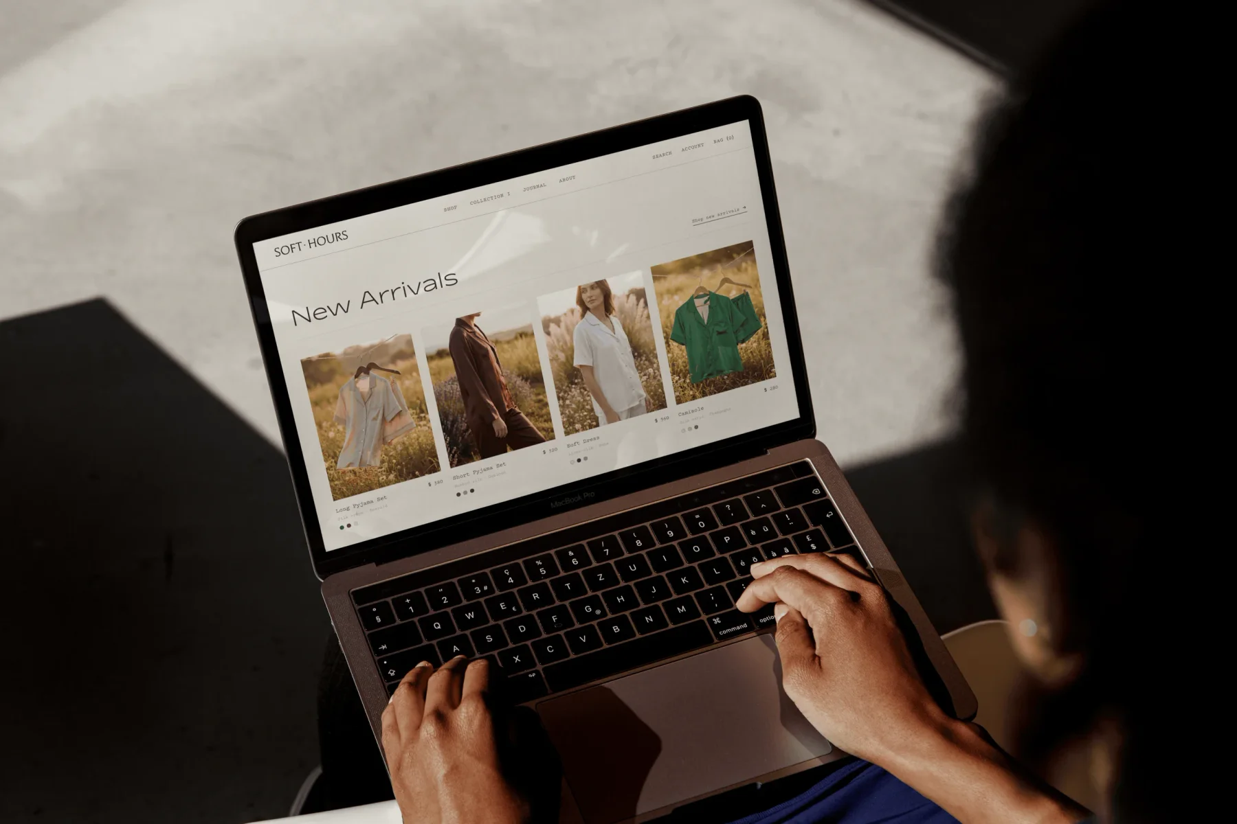 Soft Hours online shop displayed on a laptop.