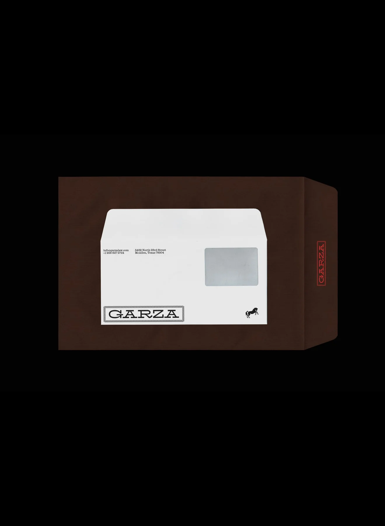 White Garza window envelope on brown stationery.