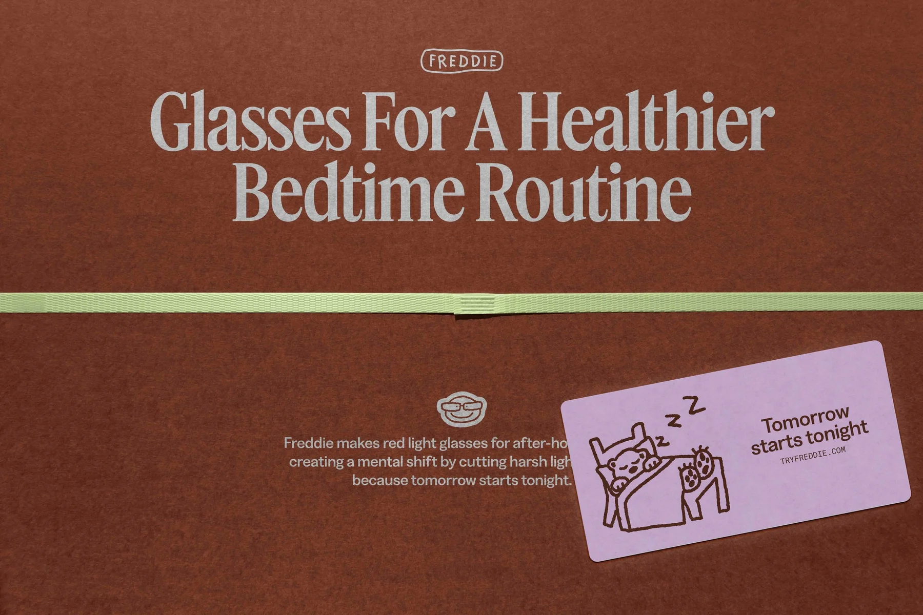 Brown Freddie typography layout with a pink illustrated card.