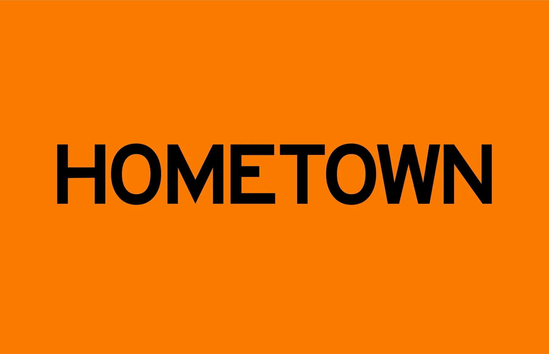 Bold black Hometown wordmark on orange.