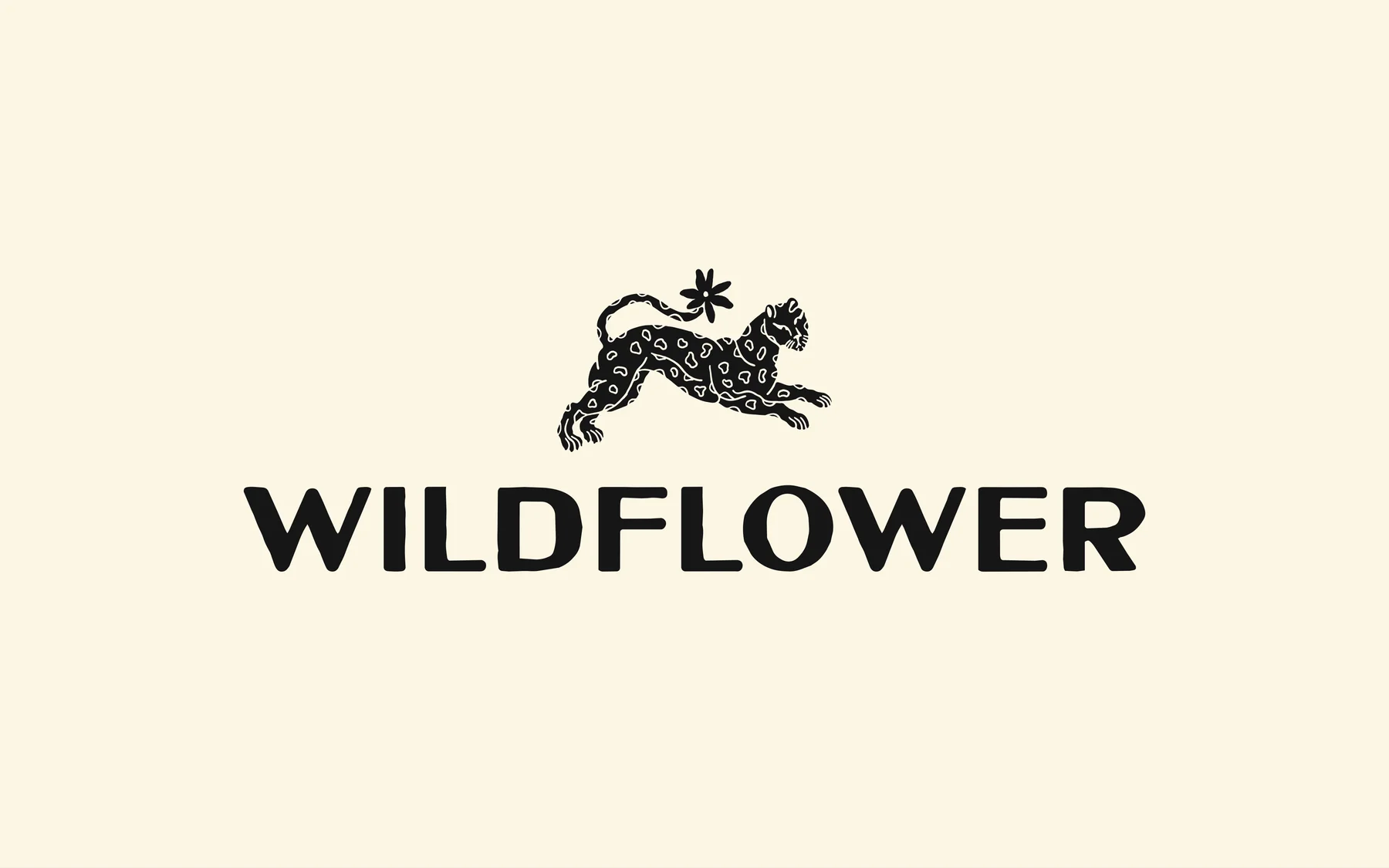 Black Wildflower wordmark and leaping animal emblem on cream.