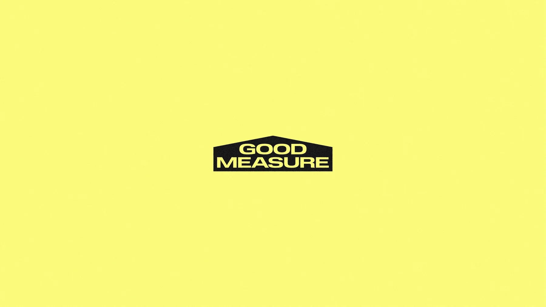 Black Good Measure wordmark on bright yellow.