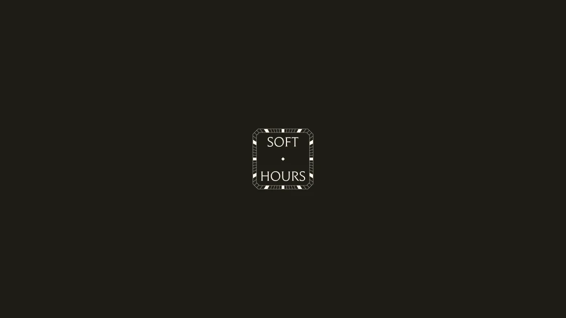 Small cream Soft Hours emblem on a dark background.