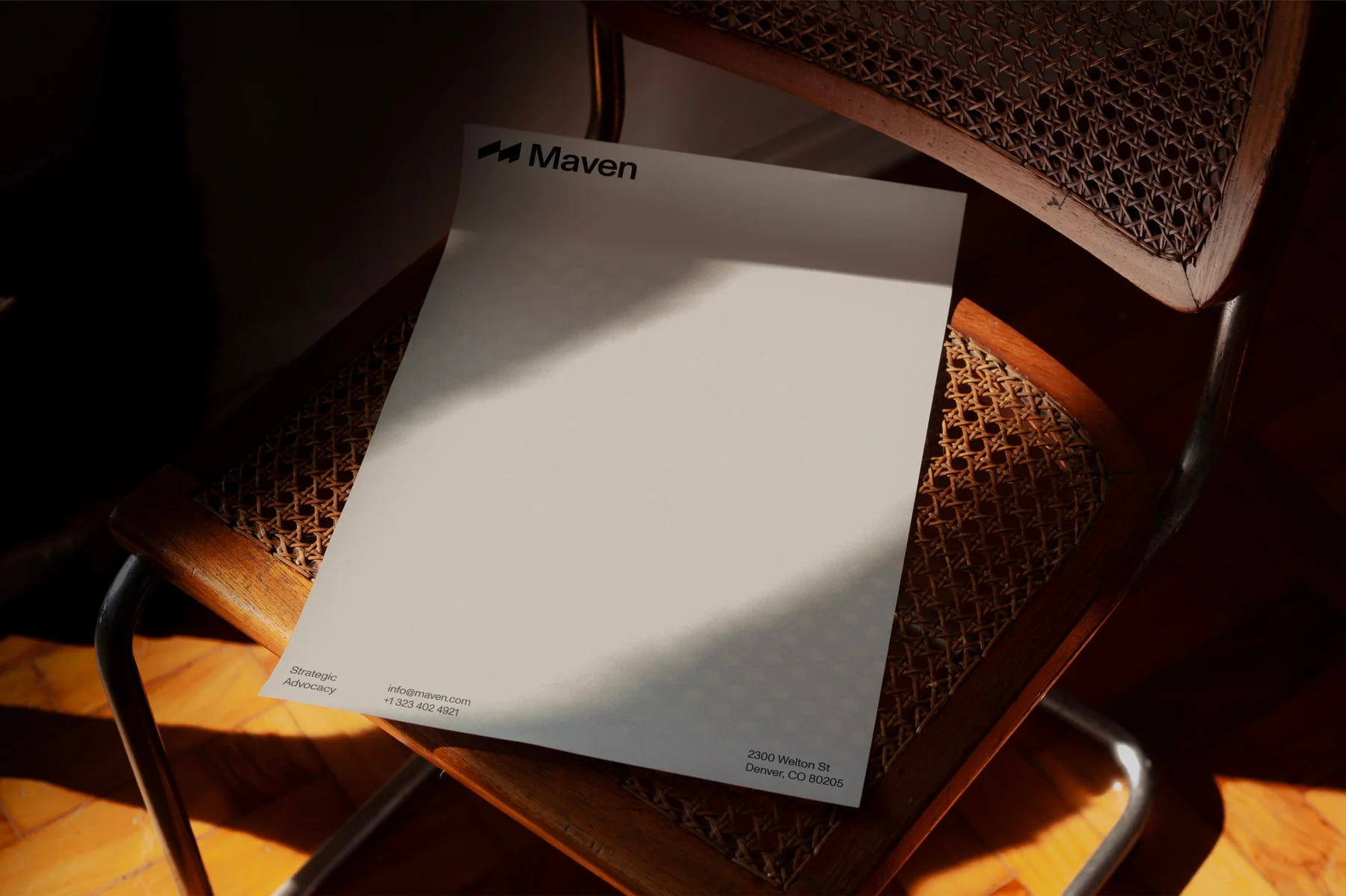 White Maven letterhead on a woven chair.