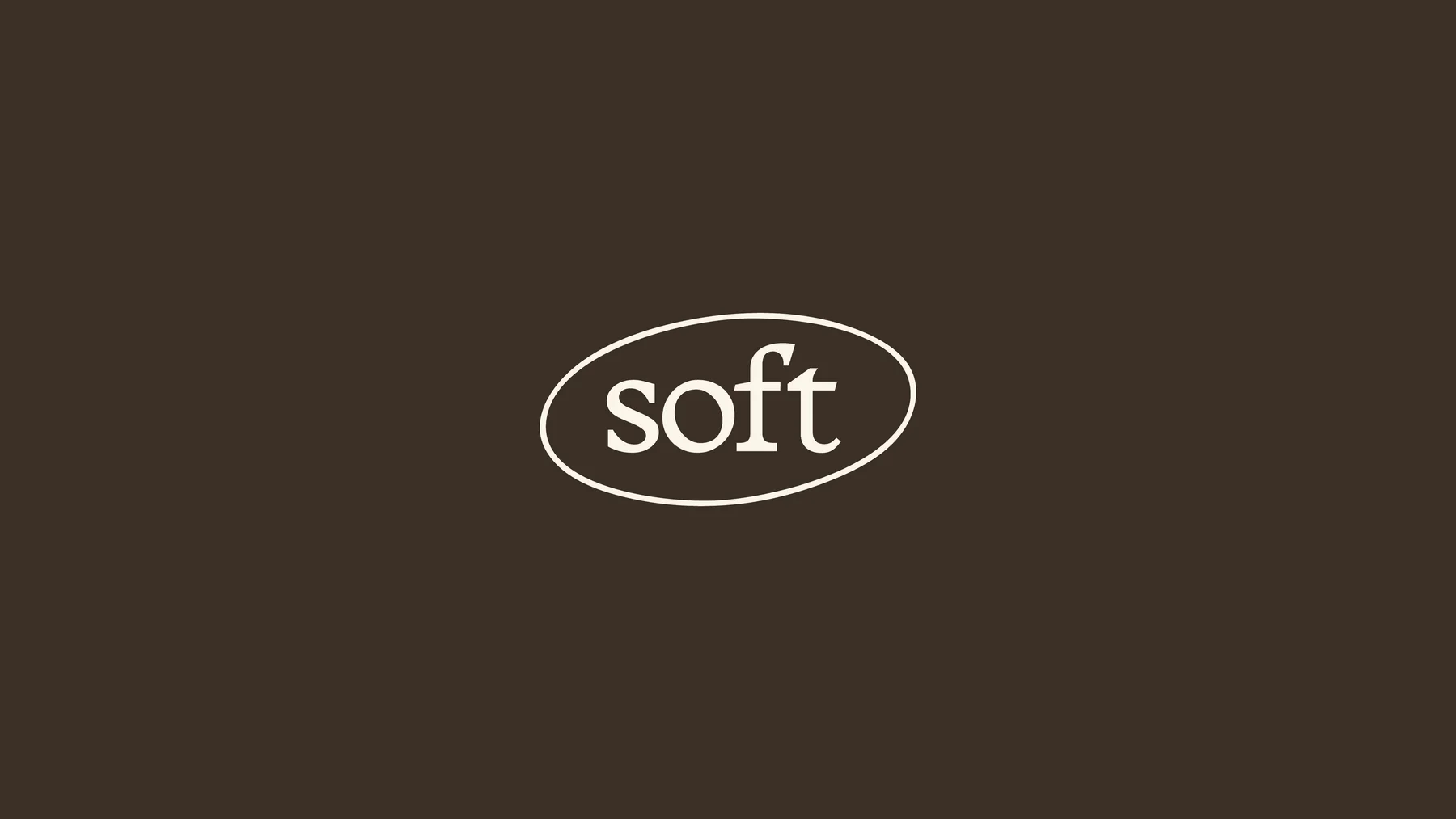 Cream Soft wordmark inside a tilted oval on brown.
