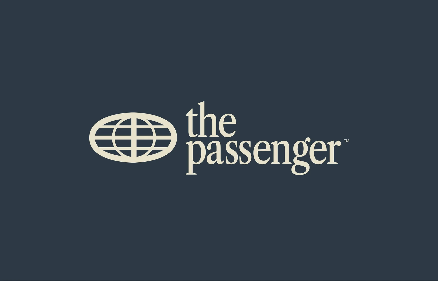 Cream The Passenger wordmark and globe emblem on dark blue-gray.