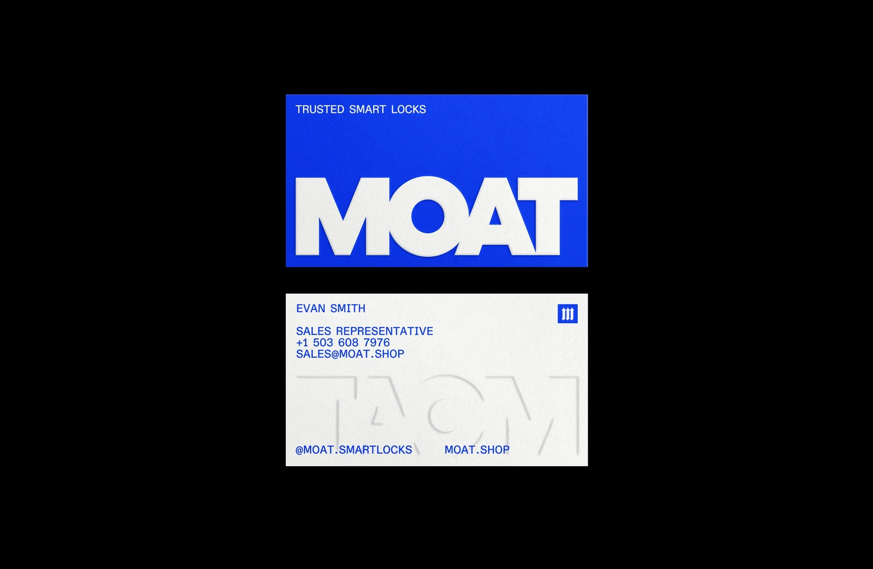 Blue and white Moat business cards with bold typography.