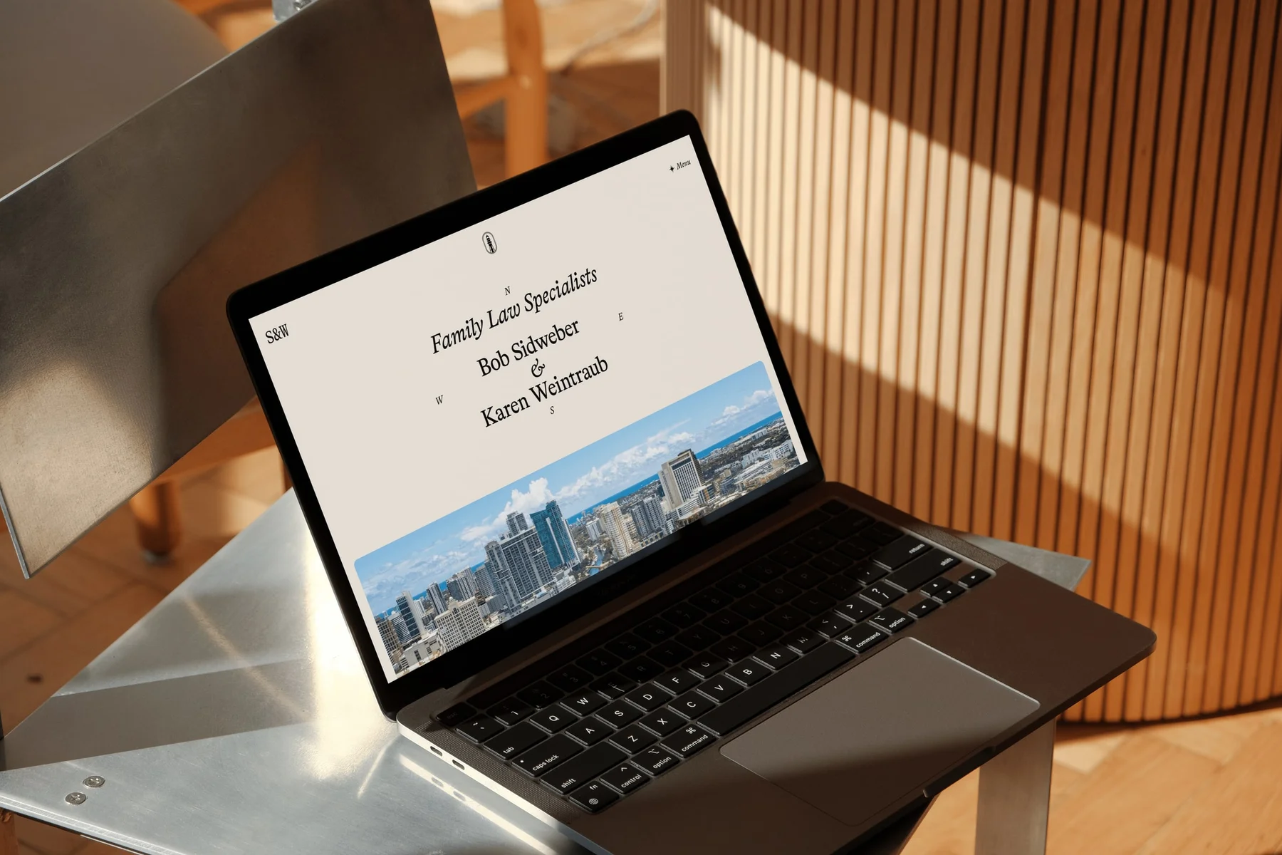 S&W website displayed on a laptop.