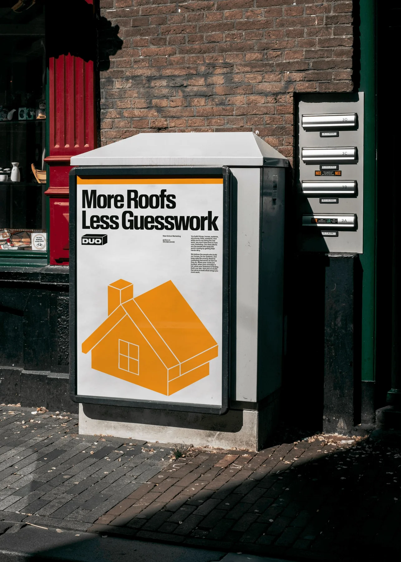 Duo street poster with an orange house illustration.