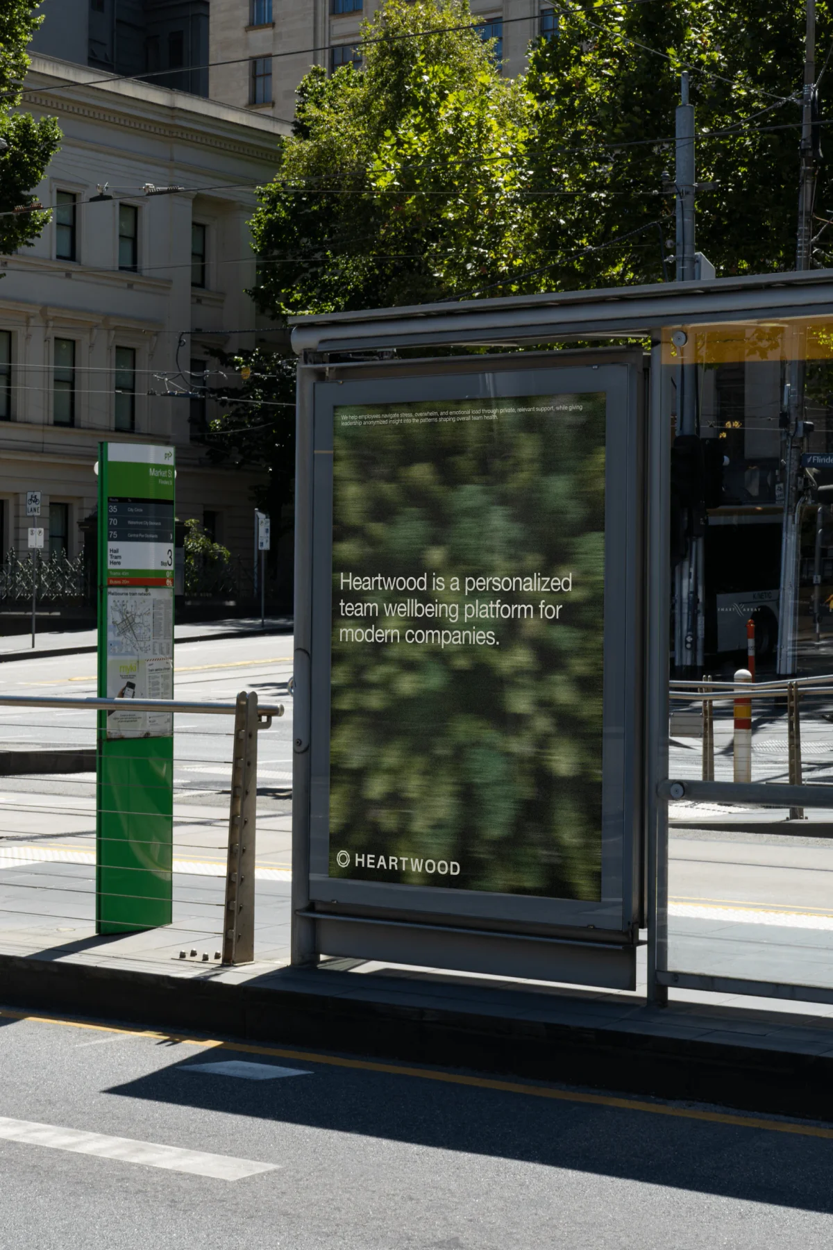 Heartwood woodland poster at a bus shelter.