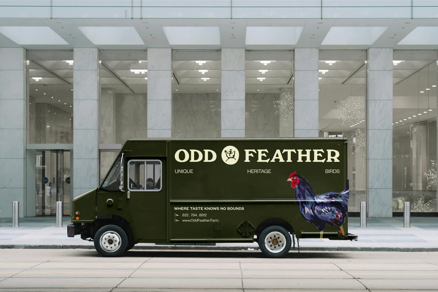 Dark green Odd Feather food truck with cream lettering.