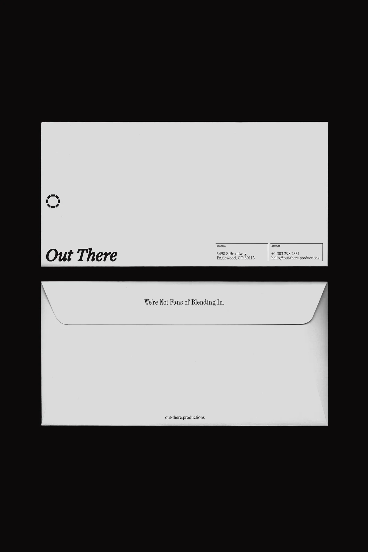 White Out There stationery and envelope on black.